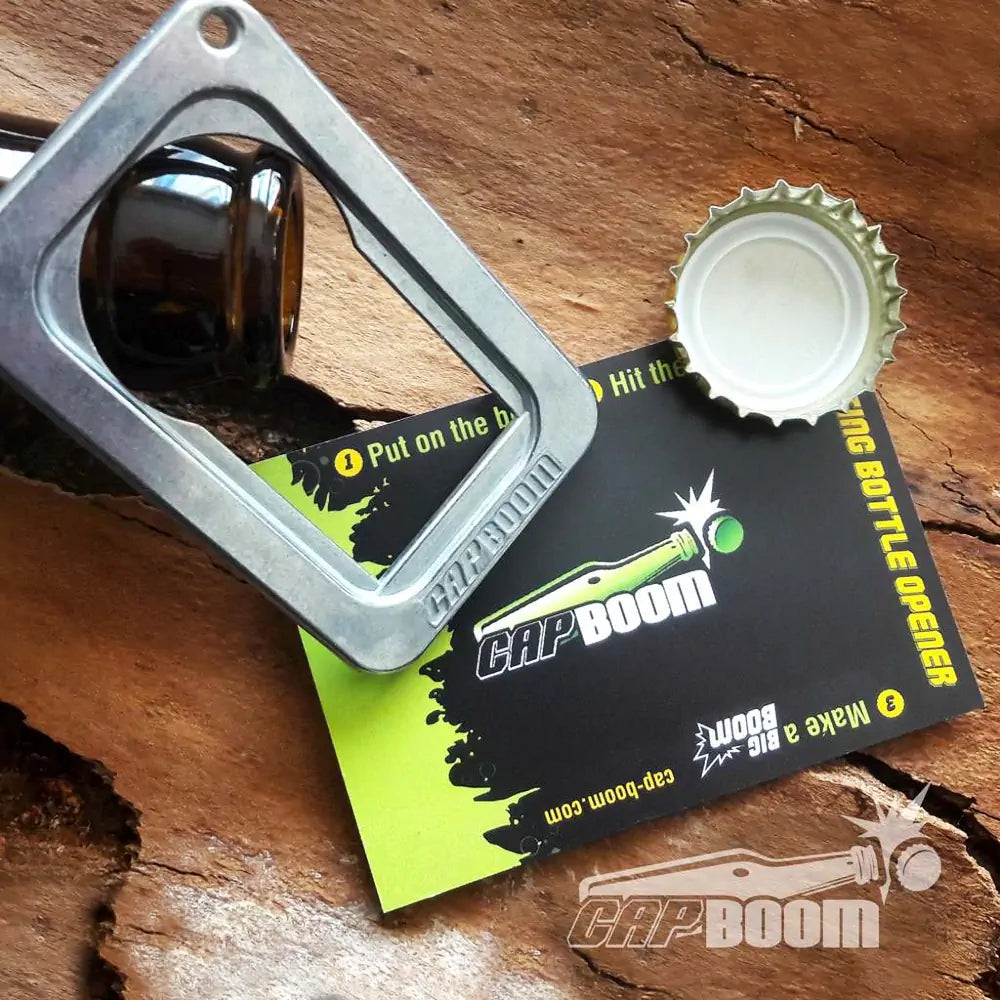 Capboom bottle opener top view with lable and cup