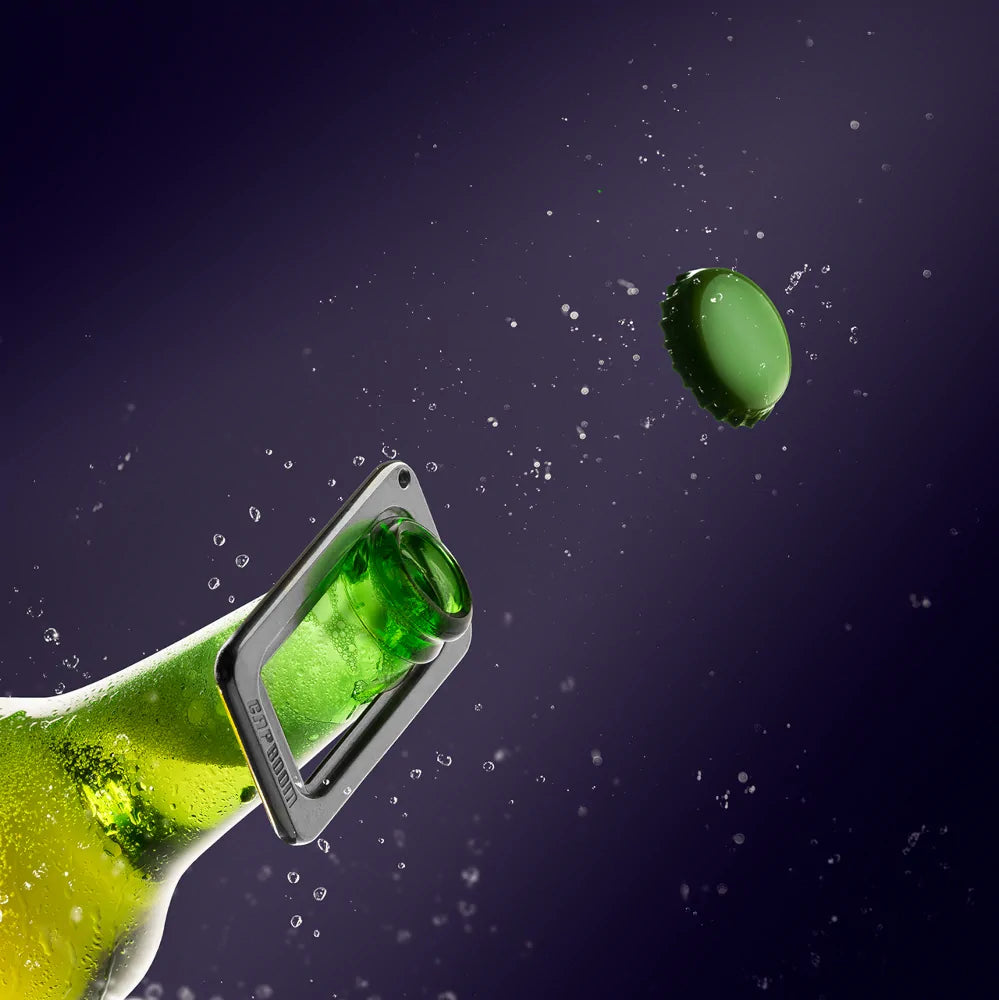 Action scene of bottle opening with CapBoom Bottle Opener